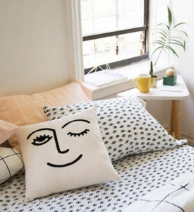 Urban Outfitters Winky Embroidered Pillow